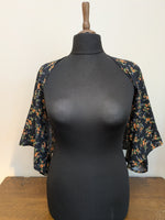 Load image into Gallery viewer, Black floral kimono shrug

