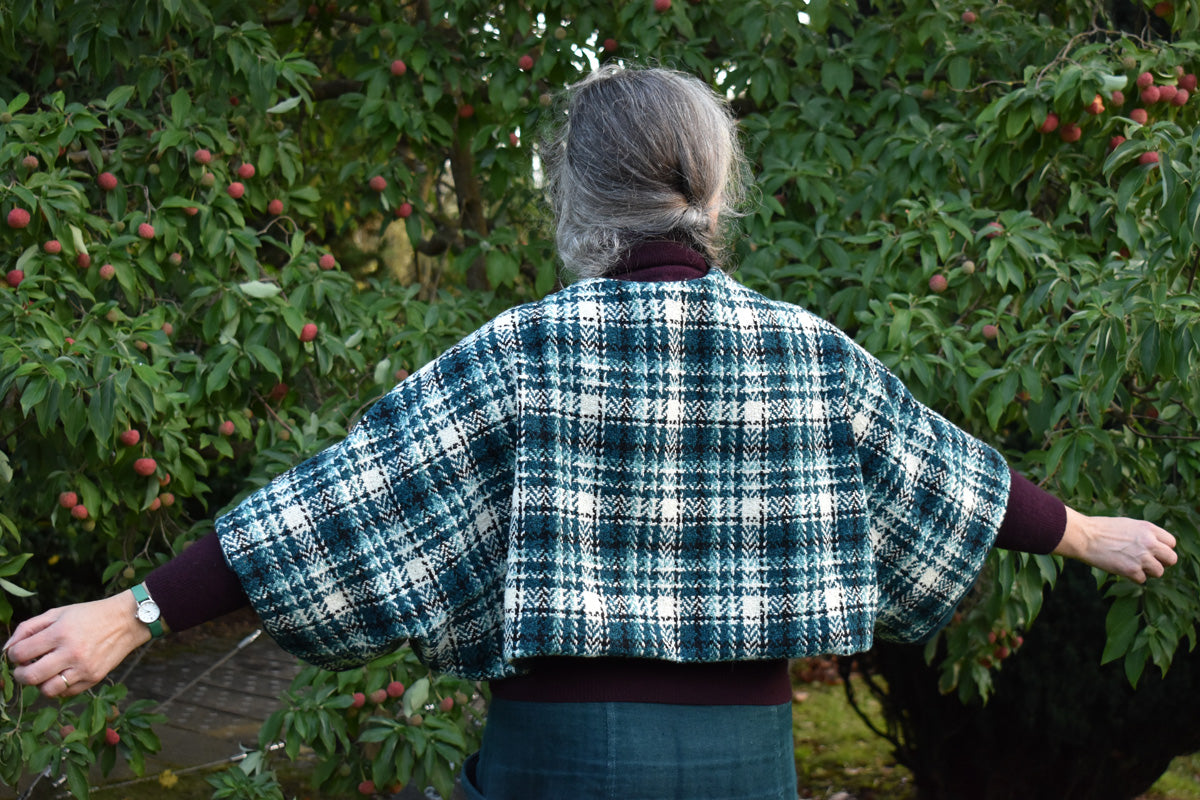 Teal check shrug