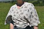 Load image into Gallery viewer, Pearl floral wrap capelet
