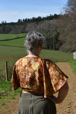 Load image into Gallery viewer, Reversible Bronze floral and gold paisley butterfly top
