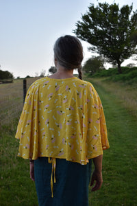 Sunshine yellow wrap cape